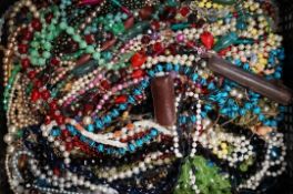A quantity of costume jewellery bead necklaces