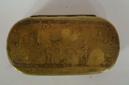 A 19th century brass oblong tobacco box, with an engraved scene to the top