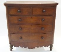 A Victorian bow front chest of drawers