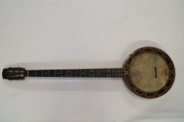 A 20th century mahogany back banjo
