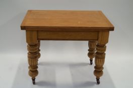 A 20th century German extending pine table