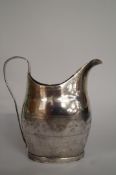 A silver cream jug, makers mark F. P., duty mark and lion passant only, circa 1780; of helmet