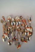 A collection of silver souvenir spoons, condiment spoons and other spoons; also some plated