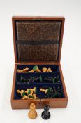 A Staunton weighted chess set boxwood and ebony, King height 9.2cm, boxed with chess board