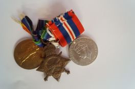 1914-15 star and victory medal, with a WW2 war medal - G.N.R.T.I. Walters R.F.A.