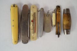 A collection of penknives, including a Jernbolaget eskilstuna barrel knife and six others