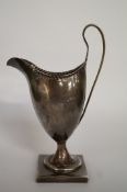 WITHDRAWN A Hester Bateman silver cream jug, London 1788, of plain pedestal helmet shape, rising