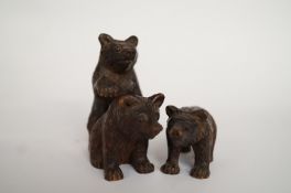 Three wooden carved Black Forest bears