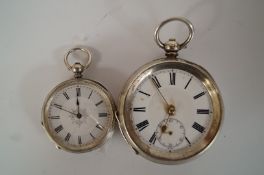A silver open faced pocket watch and a fob watch