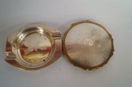 A silver ashtray, approximately 40 grams gross, with a Stratton compact