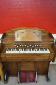 An Estey Organ Co oak organ