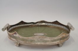 An electroplated gallery tray of oval outline, with undulating gadrooned rim, leaf capped baton