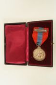 A King George VI faithful service medal, named Walter James Bailey, cased
