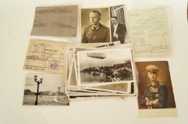 A collection of Nazi and Third Reich items including collectors photo, postcards, Hitler, Goering
