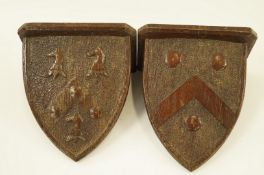 A pair of oak wall brackets