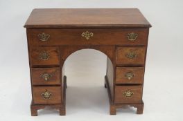 Early 19th century mahogany and pine desk