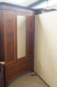 An Edwardian mahogany wardrobe