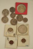 An American 1921 One Dollar coin along with various other American coins