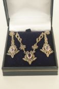 An amethyst and marcasite necklace and drop earring set, cased