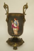 A decorative vase with bronze mounts