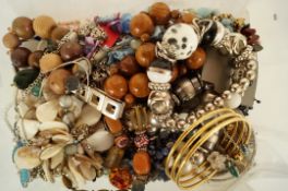 A quantity of costume jewellery including paste beads and shell jewels