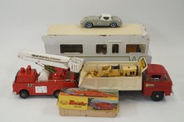 A Tonka winnebago, Louis Marx, along with various other toys