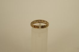 An eternity ring set with synthetic stones, 2.5 grams gross