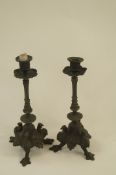 A pair of pewter candlesticks