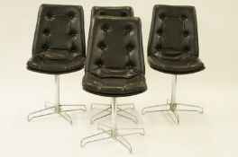 Set of four 1970s black faux leather chairs