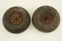 Two spitfire tail wheels