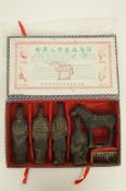 A boxed oriental set of figures & horse
