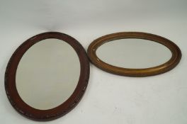 20th century mahogany oval mirror together with gilt mirror