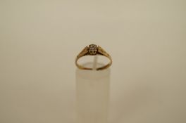 A diamond single stone 9ct gold ring, the single cut stone illusion set, finger size O1/2, 1.5g