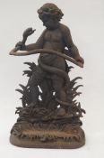 A cast iron stick stand of a cherub and serpent