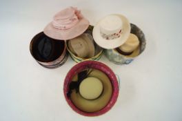 Four various ladies hats boxed