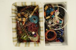 A quantity of assorted costume jewellery that includes a lady's next quartz bracelet watch