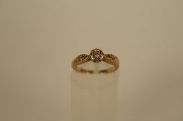 A diamond single stone 9ct gold ring, the illusion set brilliant of approximately 0.05cts, the