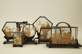 Eight various oreintal carved cork cased models