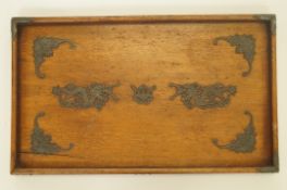 Early 20th century mahogany tea tray, inlaid with Oriental white metal motifs