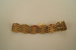 A 9ct gold five bar fancy link gate bracelet, to a padlock clasp, 17.5cm long 11g gross