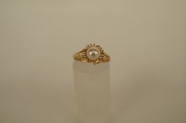 A cultured pearl single stone ring, the pearl of approximately, 6mm diameter, finger size, M 1/2,