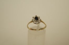 A sapphire and cubic zirconia 9ct gold cluster ring, finger size O, 1.6g gross