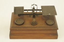 Weighing scales by Waterlow and Sons