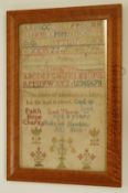 A late 19th century framed sampler by Leah Thorne of Stoke Sub Hamdon dated 1886