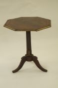 19th century rosewood occasional table on tripod base with brass mounted surround