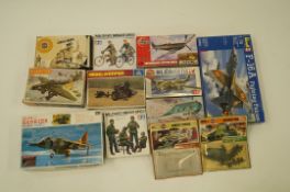 A collection of plastic military model kits