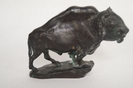 A 20th century bronze model of a bison, signed