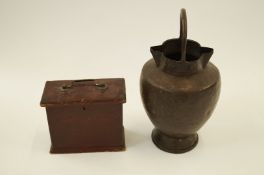A pine box and copper pot