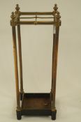 A brass and cast iron stick stand