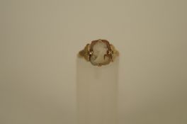 A cameo ring, stamped '9ct', finger size K 1/2, 1.5 grams